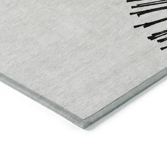 Black And Ivory Abstract Washable Indoor Outdoor Area Rug Photo 5