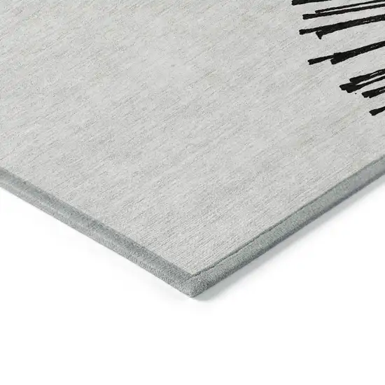 Black And Ivory Abstract Washable Indoor Outdoor Area Rug Photo 5