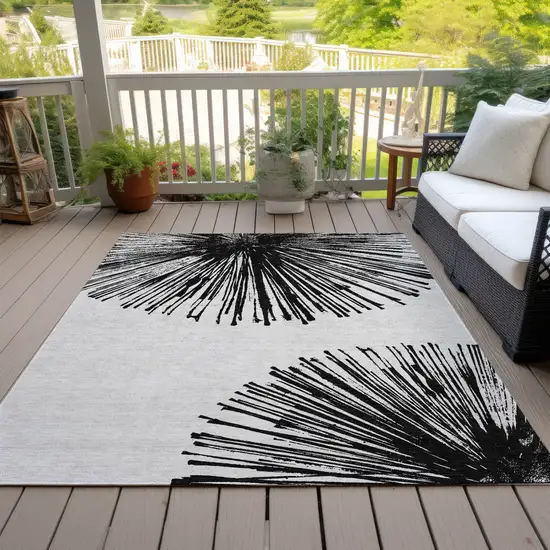 Black And Ivory Abstract Washable Indoor Outdoor Area Rug Photo 8