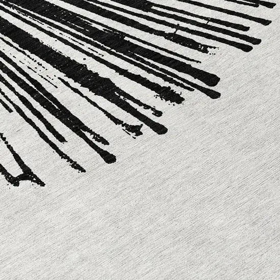 Black And Ivory Abstract Washable Indoor Outdoor Area Rug Photo 7