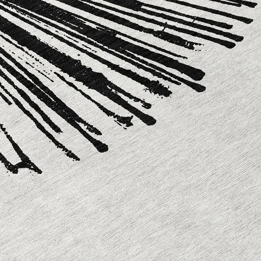 Black And Ivory Abstract Washable Indoor Outdoor Area Rug Photo 7
