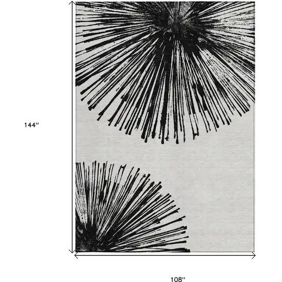 Black And Ivory Abstract Washable Indoor Outdoor Area Rug Photo 3