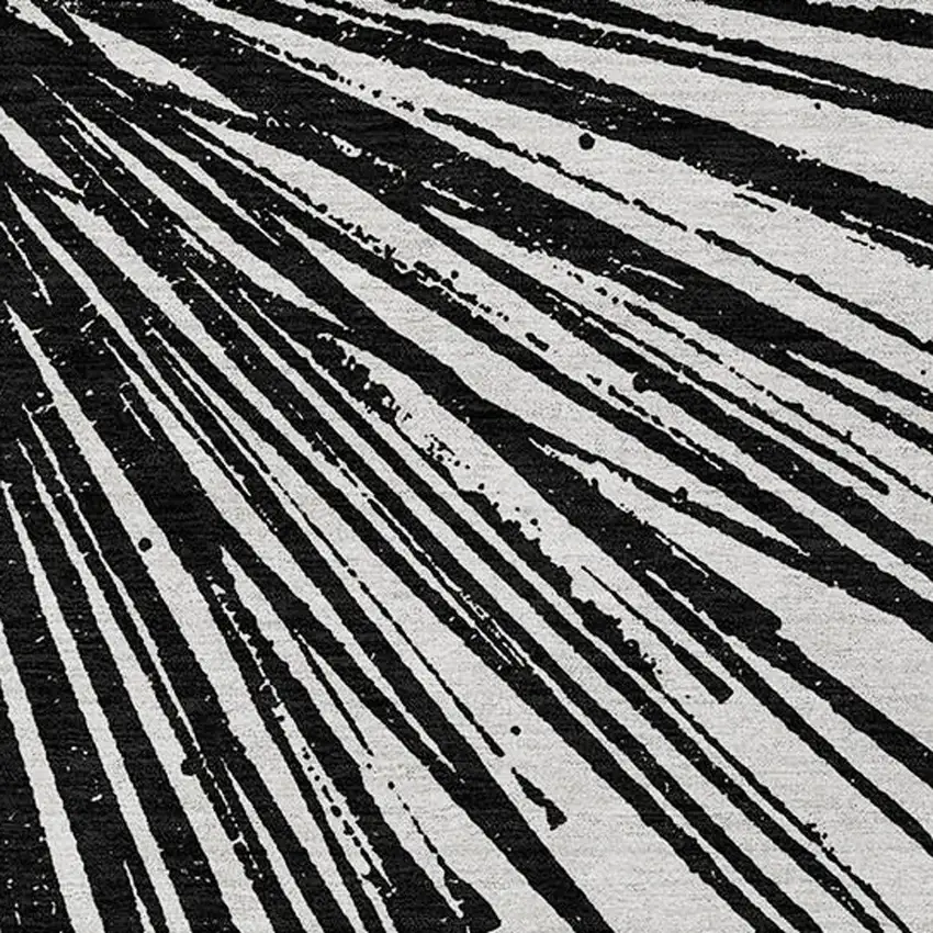 Black And Ivory Abstract Washable Indoor Outdoor Area Rug Photo 7