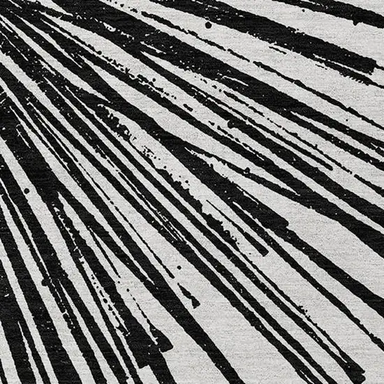Black And Ivory Abstract Washable Indoor Outdoor Area Rug Photo 6