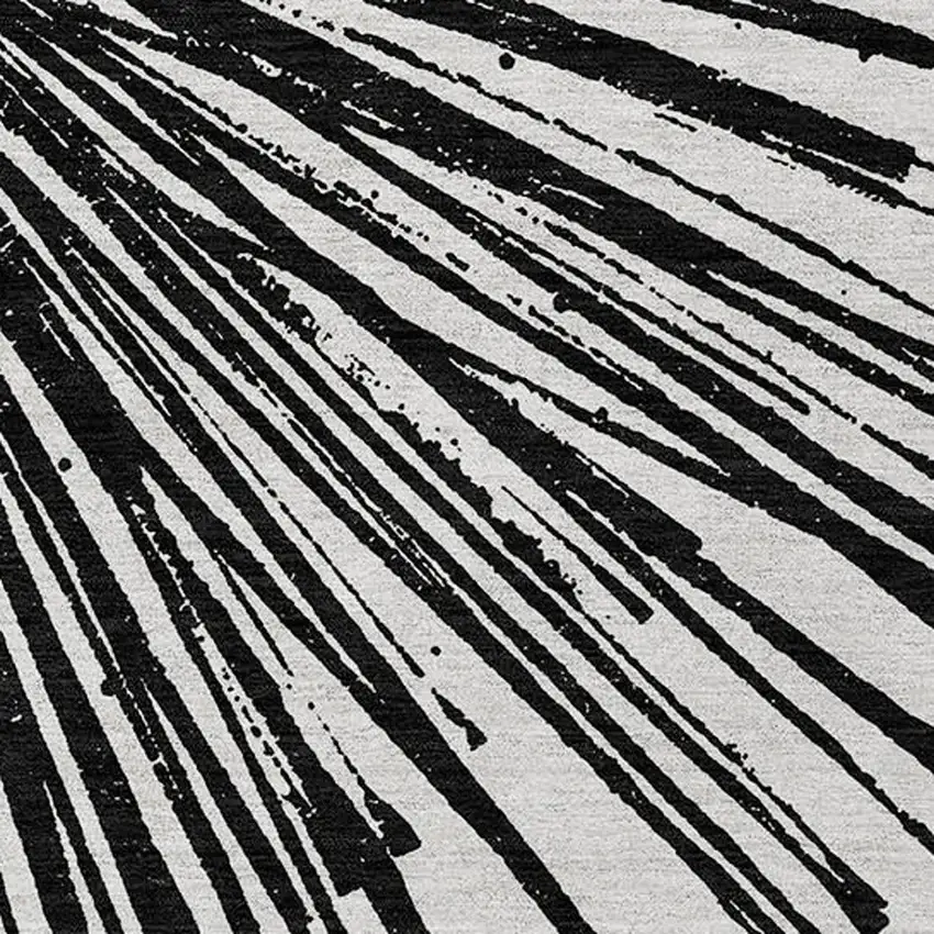 Black And Ivory Abstract Washable Indoor Outdoor Area Rug Photo 6