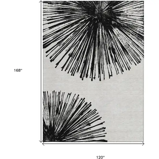 Black And Ivory Abstract Washable Indoor Outdoor Area Rug Photo 3