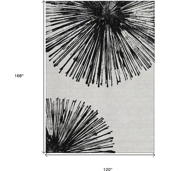 Black And Ivory Abstract Washable Indoor Outdoor Area Rug Photo 3
