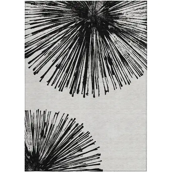 Black And Ivory Abstract Washable Indoor Outdoor Area Rug Photo 1