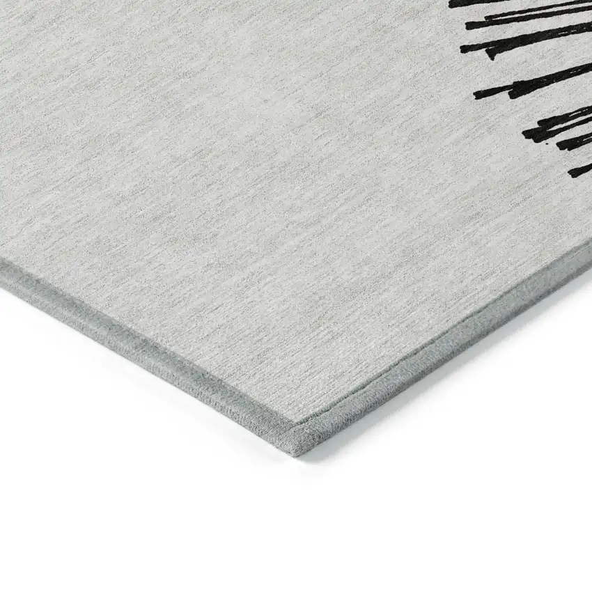 Black And Ivory Abstract Washable Indoor Outdoor Area Rug Photo 5