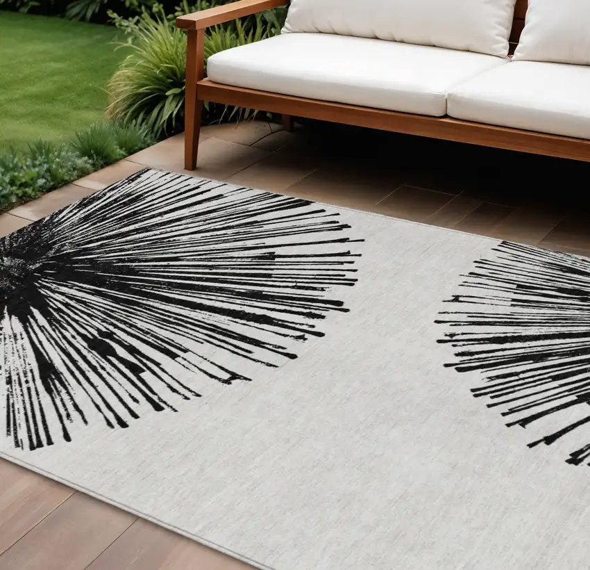 Black And Ivory Abstract Washable Indoor Outdoor Area Rug Photo 2