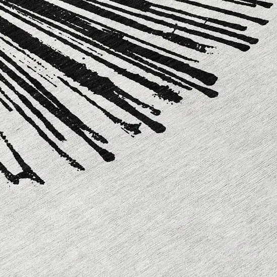 Black And Ivory Abstract Washable Indoor Outdoor Area Rug Photo 7