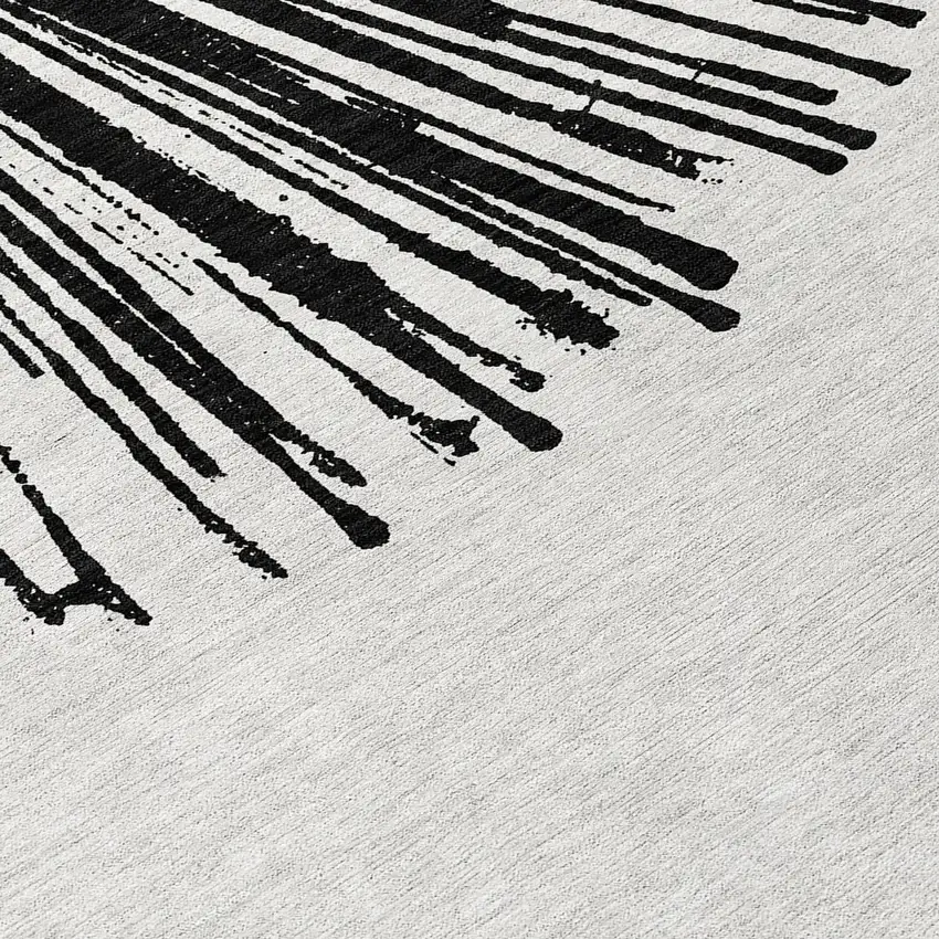 Black And Ivory Abstract Washable Indoor Outdoor Area Rug Photo 7