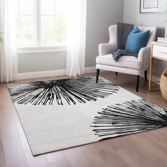 Black And Ivory Abstract Washable Indoor Outdoor Area Rug Photo 9