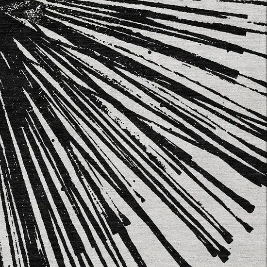 Black And Ivory Abstract Washable Indoor Outdoor Area Rug Photo 9