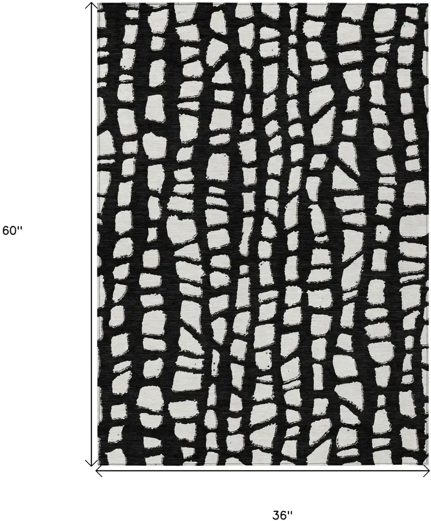 Black And Ivory Abstract Washable Indoor Outdoor Area Rug Photo 7