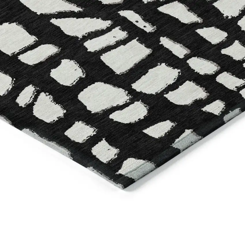 Black And Ivory Abstract Washable Indoor Outdoor Area Rug Photo 3