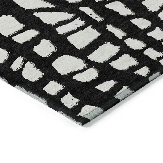 Black And Ivory Abstract Washable Indoor Outdoor Area Rug Photo 3