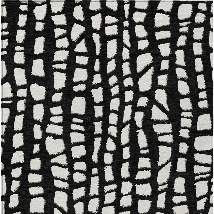 Black And Ivory Abstract Washable Indoor Outdoor Area Rug Photo 5