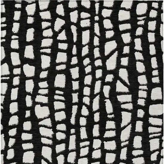 Black And Ivory Abstract Washable Indoor Outdoor Area Rug Photo 5