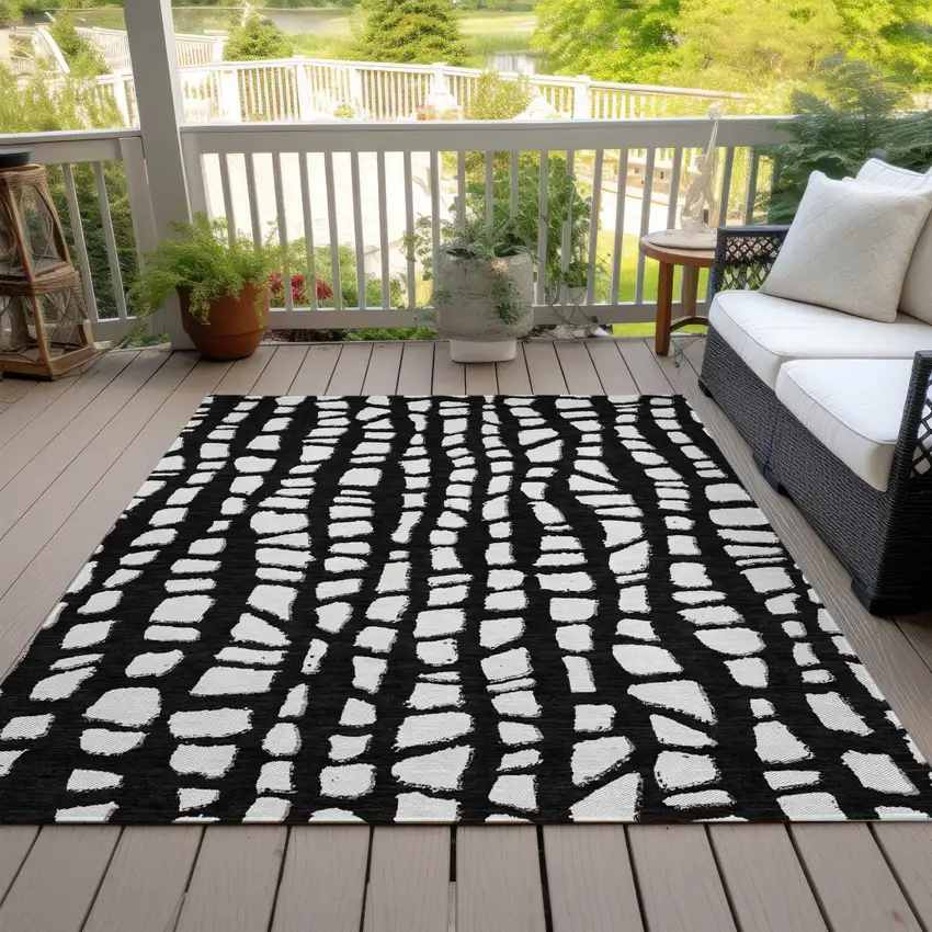 Black And Ivory Abstract Washable Indoor Outdoor Area Rug Photo 6