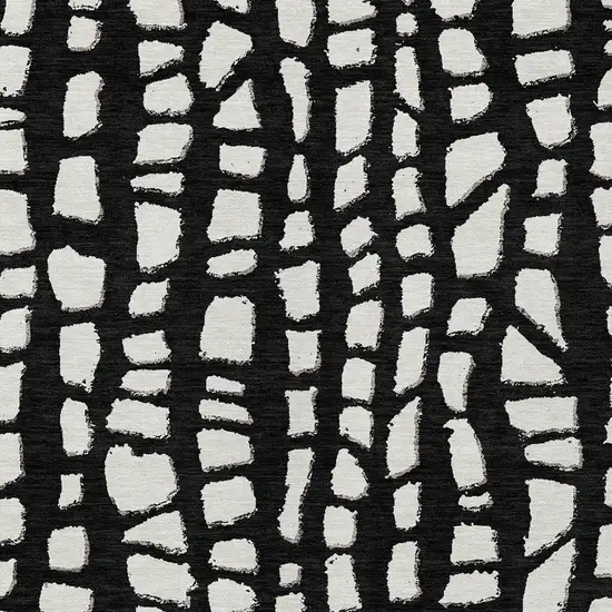 Black And Ivory Abstract Washable Indoor Outdoor Area Rug Photo 5
