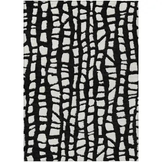 Black And Ivory Abstract Washable Indoor Outdoor Area Rug Photo 1