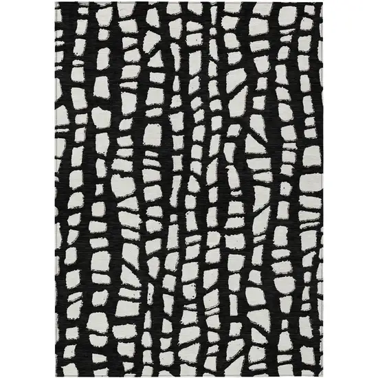 Black And Ivory Abstract Washable Indoor Outdoor Area Rug Photo 1