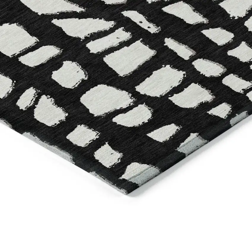 Black And Ivory Abstract Washable Indoor Outdoor Area Rug Photo 3