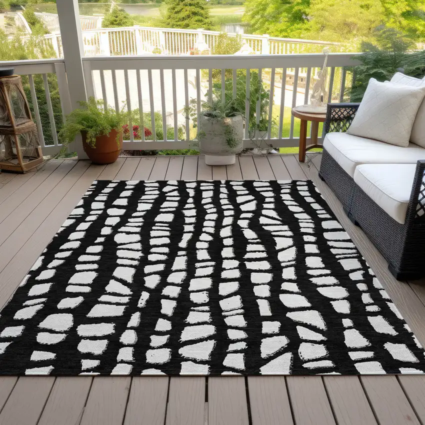 Black And Ivory Abstract Washable Indoor Outdoor Area Rug Photo 6