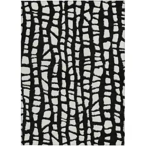 Photo of Black And Ivory Abstract Washable Indoor Outdoor Area Rug