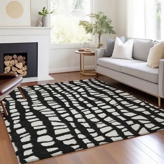 Black And Ivory Abstract Washable Indoor Outdoor Area Rug Photo 8