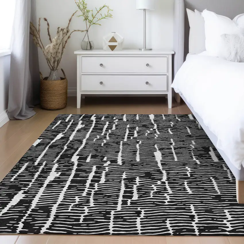 Black And Ivory Abstract Washable Indoor Outdoor Area Rug Photo 9