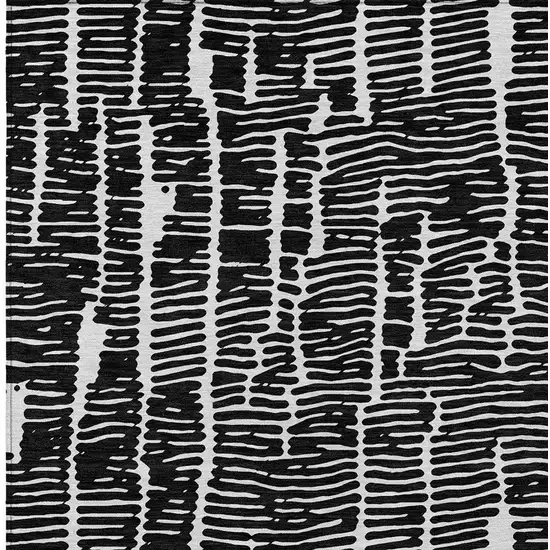 Black And Ivory Abstract Washable Indoor Outdoor Area Rug Photo 6
