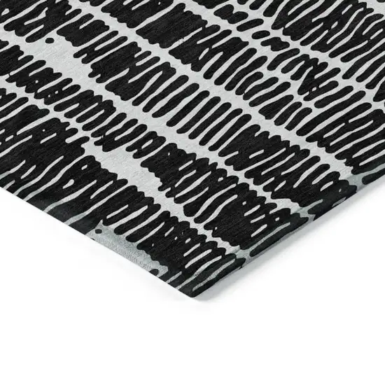 Black And Ivory Abstract Washable Indoor Outdoor Area Rug Photo 4