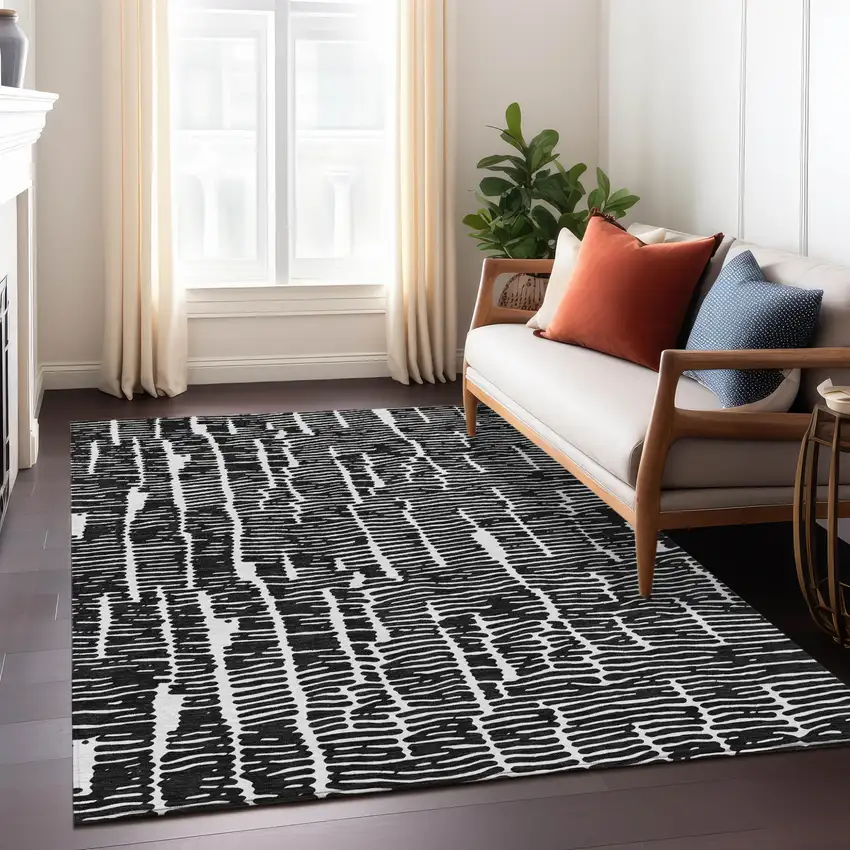 Black And Ivory Abstract Washable Indoor Outdoor Area Rug Photo 9