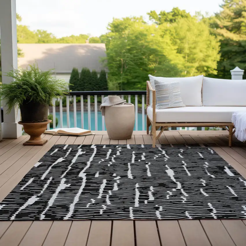 Black And Ivory Abstract Washable Indoor Outdoor Area Rug Photo 9