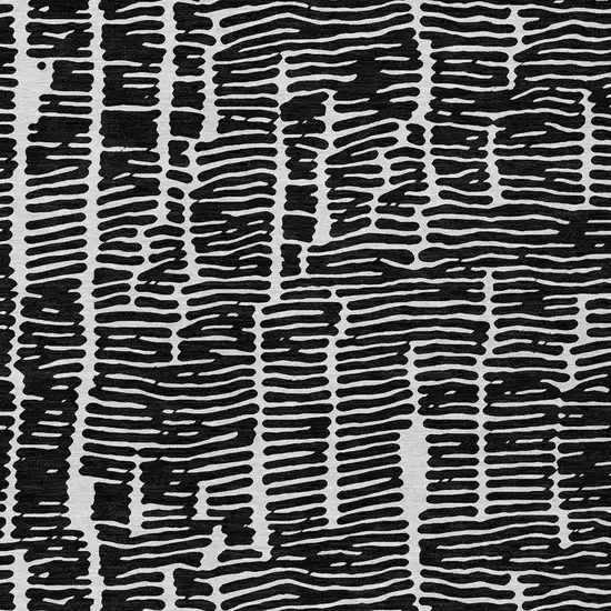 Black And Ivory Abstract Washable Indoor Outdoor Area Rug Photo 6