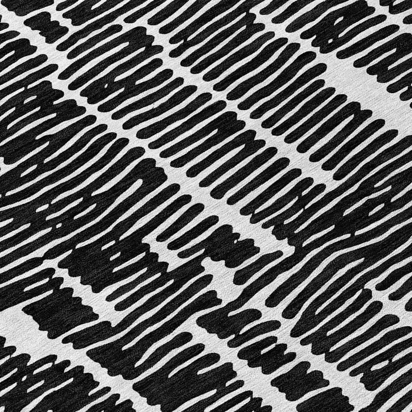Black And Ivory Abstract Washable Indoor Outdoor Area Rug Photo 8