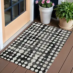 Photo of Black And Ivory Abstract Washable Indoor Outdoor Area Rug