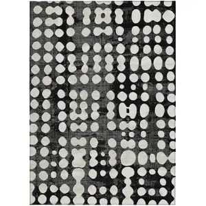 Photo of Black And Ivory Abstract Washable Indoor Outdoor Area Rug
