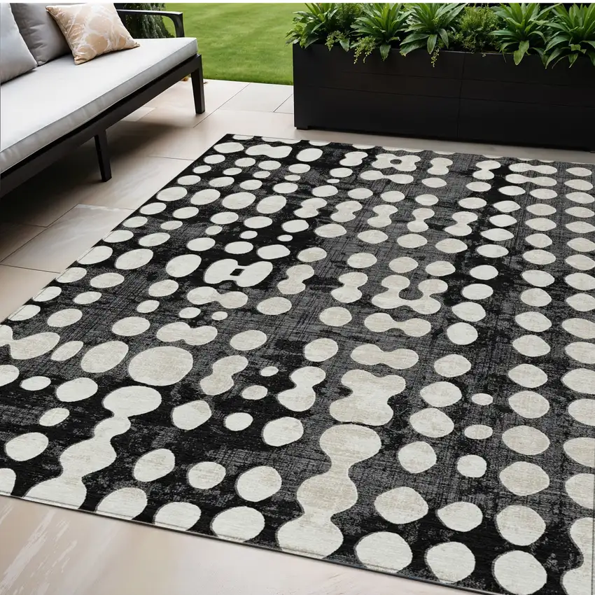 Black And Ivory Abstract Washable Indoor Outdoor Area Rug Photo 1