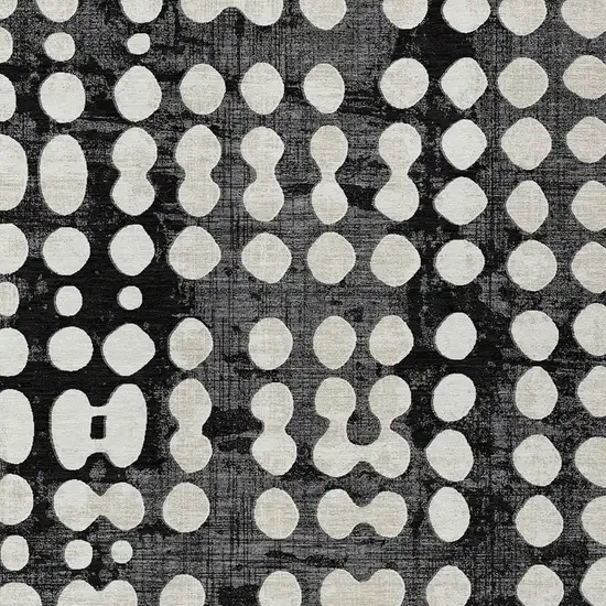 Black And Ivory Abstract Washable Indoor Outdoor Area Rug Photo 6