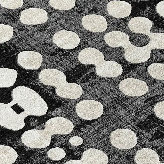 Black And Ivory Abstract Washable Indoor Outdoor Area Rug Photo 9