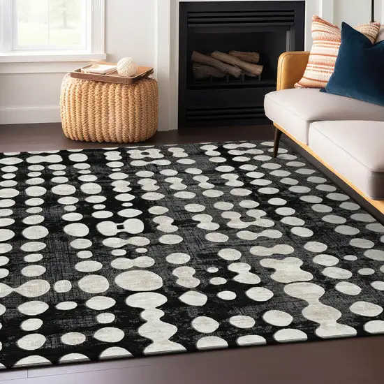 Black And Ivory Abstract Washable Indoor Outdoor Area Rug Photo 8