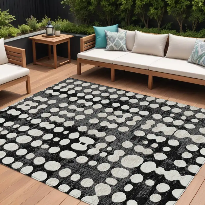 Black And Ivory Abstract Washable Indoor Outdoor Area Rug Photo 1