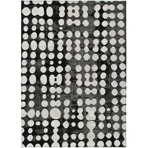 Photo of Black And Ivory Abstract Washable Indoor Outdoor Area Rug
