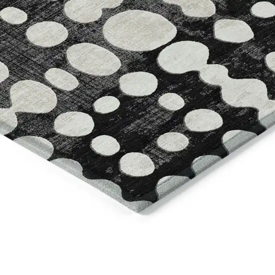 Black And Ivory Abstract Washable Indoor Outdoor Area Rug Photo 5