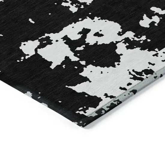 Black And Ivory Abstract Washable Indoor Outdoor Area Rug Photo 4