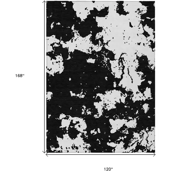 Black And Ivory Abstract Washable Indoor Outdoor Area Rug Photo 3