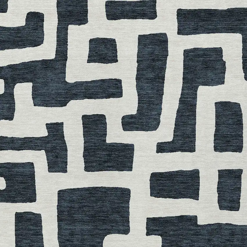 Black And Ivory Abstract Washable Indoor Outdoor Area Rug Photo 6